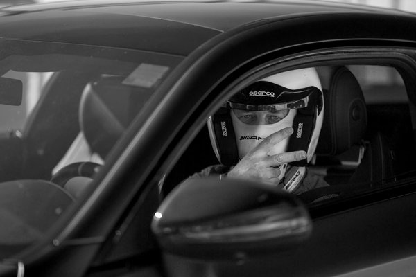 How can you effectively communicate with other road users as a motorcyclist?